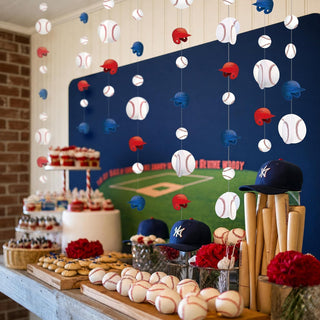 Baseball sports party garland with hanging baseballs and red/blue bird ornaments overhead