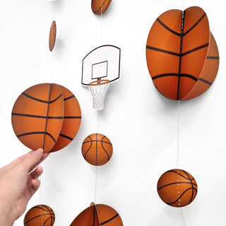 Basketball ornament garland with mini hoop cutouts and orange basketballs on string