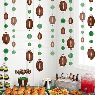 Brown football and green plaid circle 3D garland hanging across a doorway