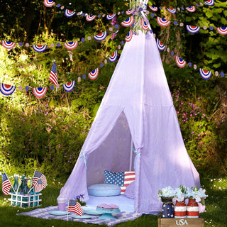 Hanging red, white and blue semicircle banner garlands above a white tent canopy