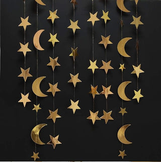 Gold star and moon paper garland curtain with vertical strands