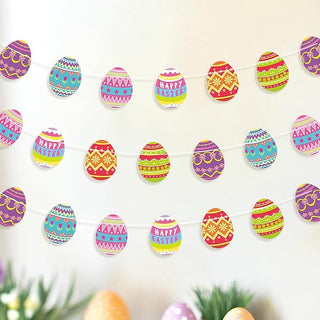 Colorful Easter egg garland with patterned paper eggs on white string, looped ends