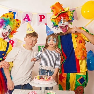 Party group wearing colorful pom pom cone hats with “MAKE” and “A TIME” prints