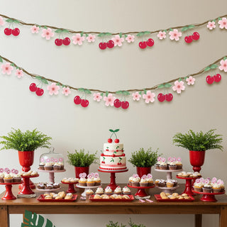 Cherry and blossom banner garland with red cherries, pink flowers, and green leaves across