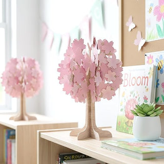 Cherry blossom tree centerpiece on a wooden base with pink 3D flower petals