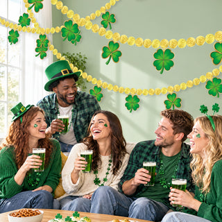 Gold coin paper garland with green shamrock cutouts, draped in looping strands