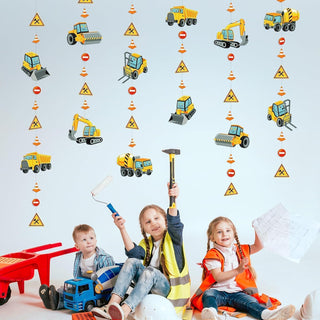 Construction truck themed garland decorations showing multiple yellow vehicles, cones, and caution icons