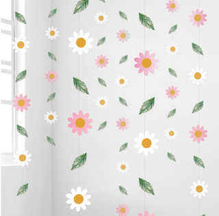 Paper floral party garland backdrop with white, pink and yellow daisies and green leaves