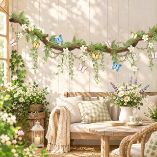 Floral butterfly wall banner garland draped along wall with blossoms and blue butterflies