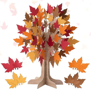 Wooden tree centerpiece with layered 3D autumn maple leaves in red, orange, and yellow
