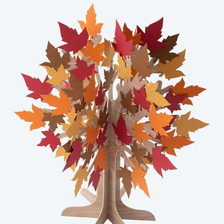 Wooden tree centerpiece with dense layered 3D autumn leaves in red, orange, and brown