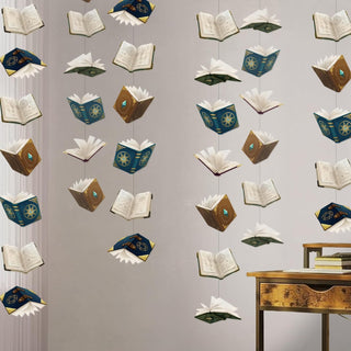 Flying spellbook garland with floating open books in dark blue and brown