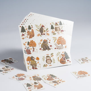 Set of forest animal temporary tattoo sheets with pine, owl, fox, and mushrooms