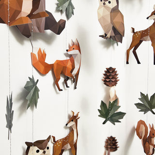 Woodland animal garland with hanging deer, fox, owl, pinecone and leaf ornaments