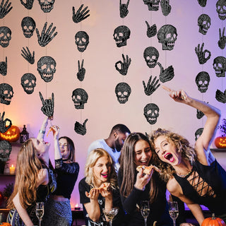 Black glitter skull and hand garland for Halloween decorations