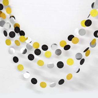 Graduation circle dots garland with black, gold, and white hanging disks
