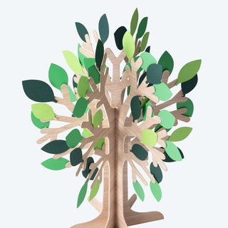 Standing tree centerpiece decor with layered green paper leaves and wooden trunk