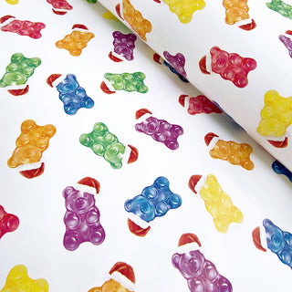 Candy bear printed gift wrap sheet with multicolor gummy bears and red candy tips