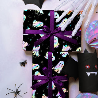 Halloween ghost gift wrap with black background, iridescent print, purple satin ribbon