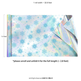Unrolled iridescent gift wrap sheet with blue snowflake pattern and rainbow sheen