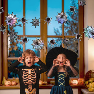 Iridescent spiderweb garland with holographic spider webs and black spiders for Halloween party decorations