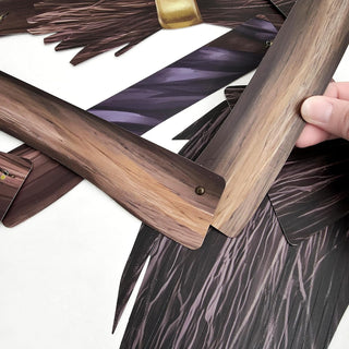 Close-up of broomstick decoration with wood-toned handles and bundled brush bristles