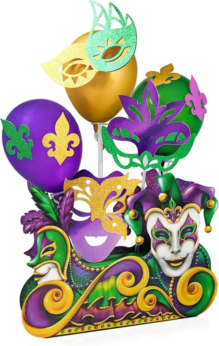 Mardi Gras table centerpiece set with gold, purple and green mask toppers on sticks