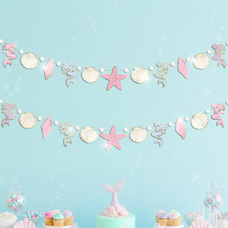 Pastel undersea banner garland with starfish, shells, and seahorse cutouts