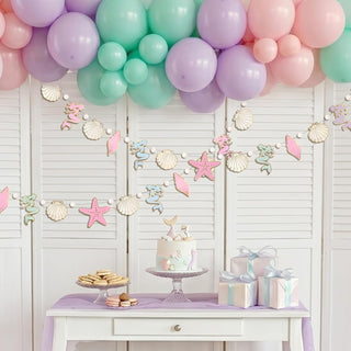 Pastel undersea banner garland with starfish, shells, and seahorse cutouts