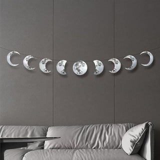 Silver moon phase banner with nine hanging crescent and full moon ornaments