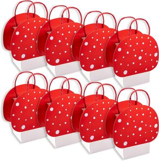 Multiple red polka-dot mushroom gift bags with white dots and red handles, 8-pack