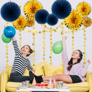 Gold and navy blue paper fan garland with pom-pom fans and dangling bead strands