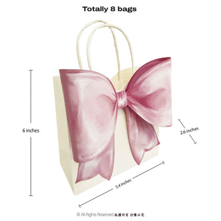 Pink gift bag with oversized bow and rope handles, shown with bag size