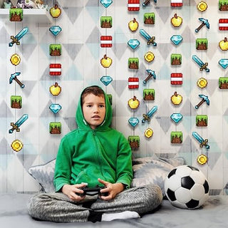 Gaming pixel wall banner decorations with a child sitting indoors, surrounded by pixel icons