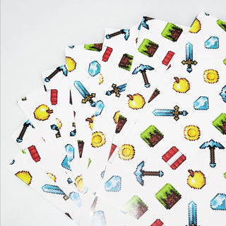 Stack of pixel game icons wrapping paper sheets with white background