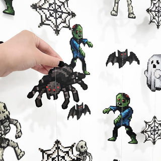 Pixel monster Halloween garland with hanging pixel charms: zombie, bat, spider, and ghost figures