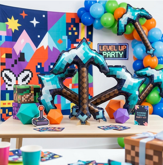 Pickaxe-shaped foil balloon centerpiece, teal check pattern with brown diamond stripe