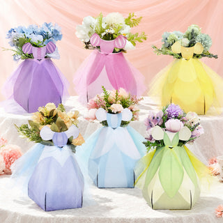 Pastel flower centerpiece bags set with bow ties and tiered fold details
