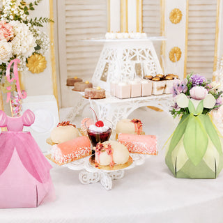 Decorative flower centerpiece bags in pink, green, and white with cutout handles