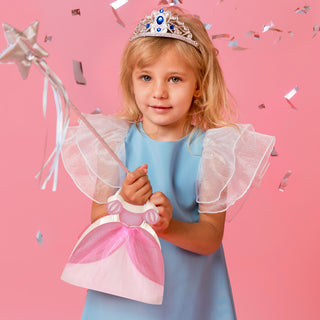 Princess dress gift bag in small blue tulle-style dress shape held by a smiling child
