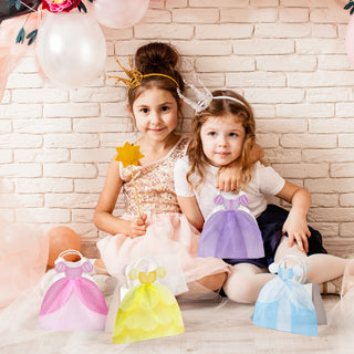 Princess dress gift bags with pink, yellow, blue and purple dress shapes shown with two kids