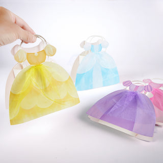 Princess dress gift bags held in hand: yellow, blue and purple paper dress shapes