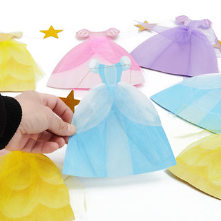 Close-up of pastel tulle dress pennants with star accents on a Happy Birthday banner