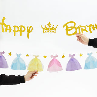 Gold Happy Birthday banner with crown motif and pastel tulle dress pennant decorations