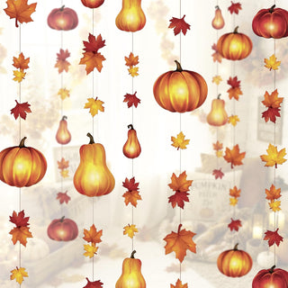 Pumpkin and maple leaf garland hanging in repeating rows for fall decoration