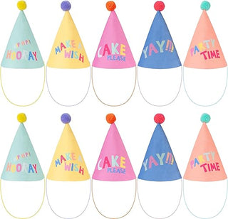 Pastel rainbow party hats in cone shape with pom pom, printed with phrases like "Make a Wish," "Cake Please," and "Yay!!!"