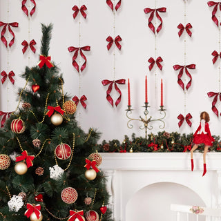 Red satin bow hanging garland with gold bead strands and ribbon bow accents
