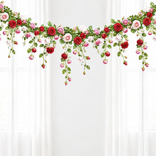 Floral rose garland banner with red, pink, and white blossoms and trailing green vines