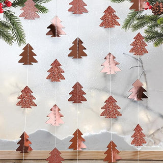 Rose gold Christmas tree garland with assorted tree cutouts on hanging strings