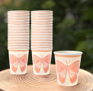 9oz paper cups with orange butterfly print, stacked outdoors, pack of 50